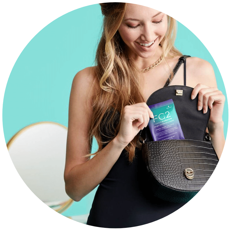 FC2 Female Condom sachet in female hand